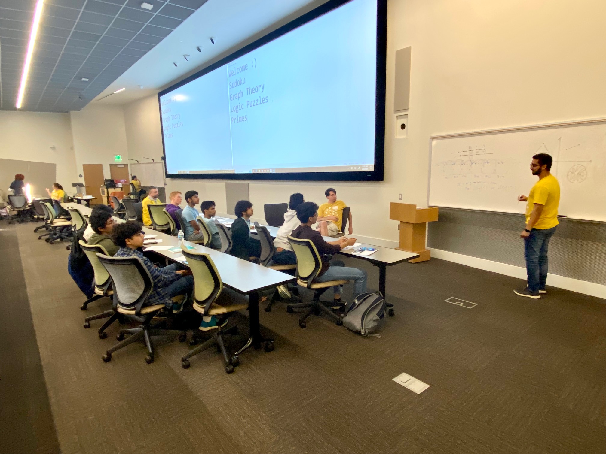 Abhishek Dhawan, a Ph.D. student in the School of Mathematics, leads a session on combinatorics during Georgia Tech High School Math Day. (Photo Renay San Miguel)