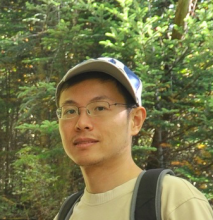 Molei Tao holding his College of Sciences Faculty Development Award during the 2022 Spring Sciences Celebration.